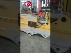 Test met telescopische schuifarm van een graafmachine